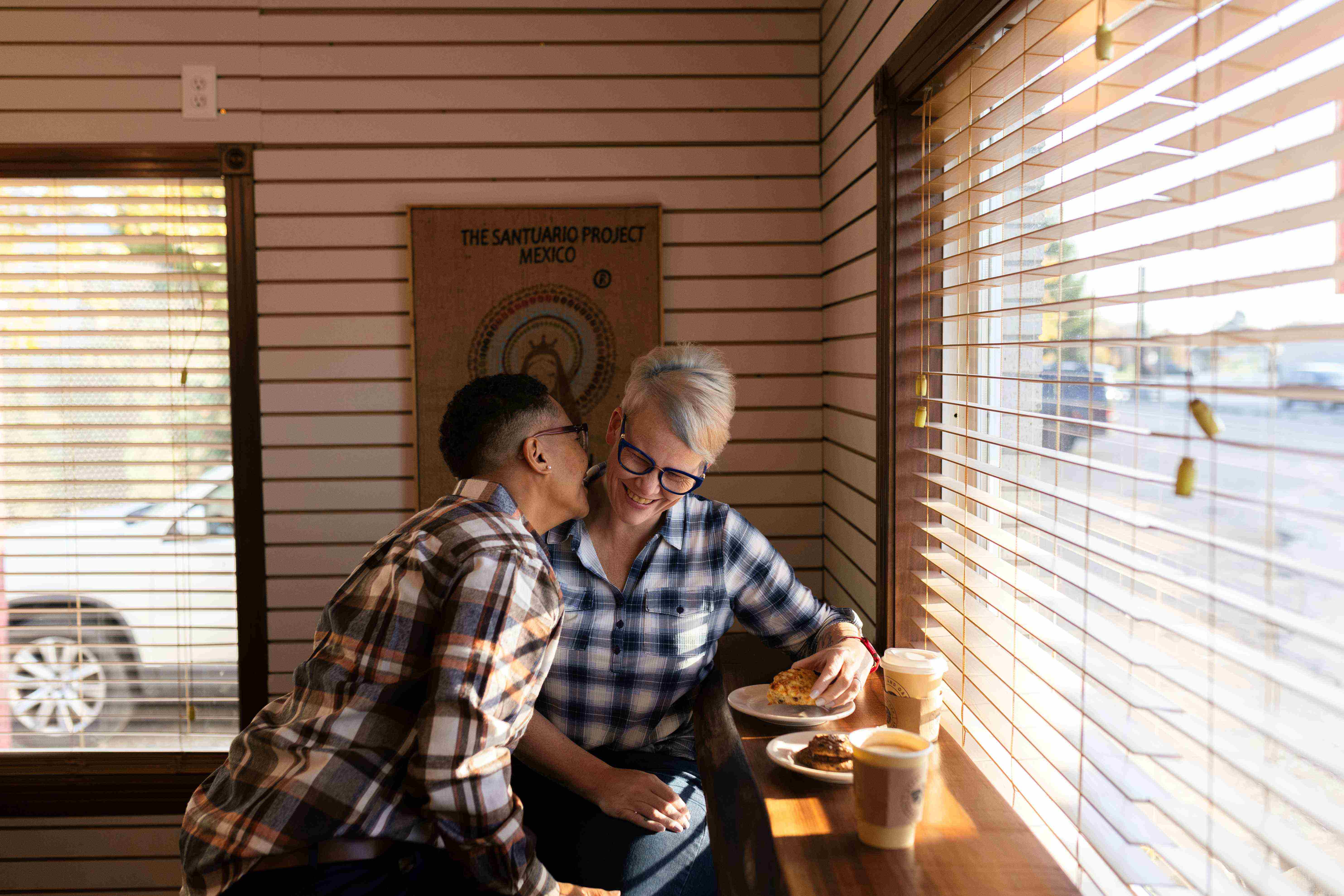 Couple laughing inside Acorn & Oak
